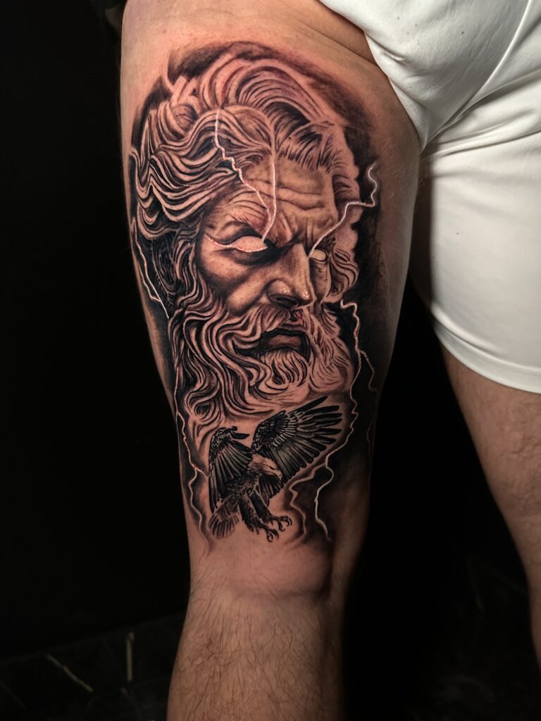 Realistic tattoo using black and grey ink
